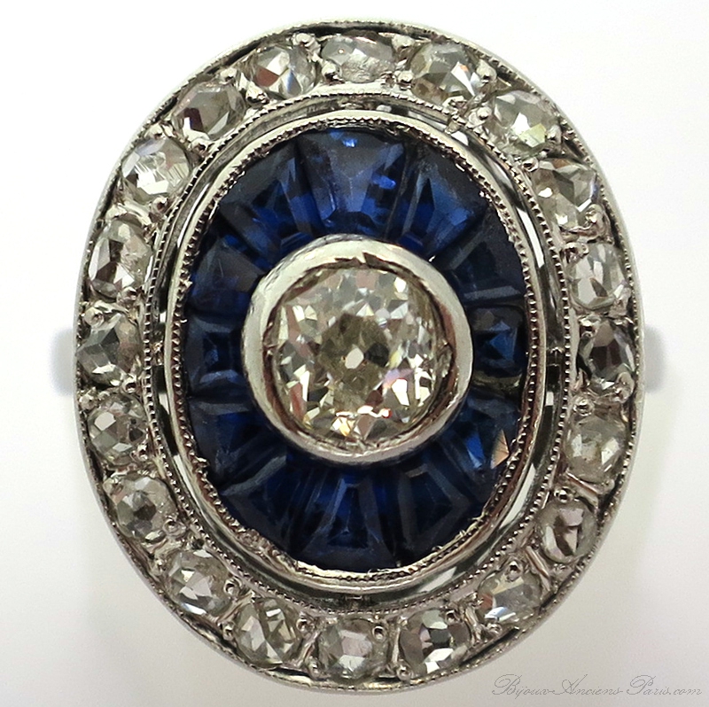 Bague diamants pierres bleues monture or blanc 1602