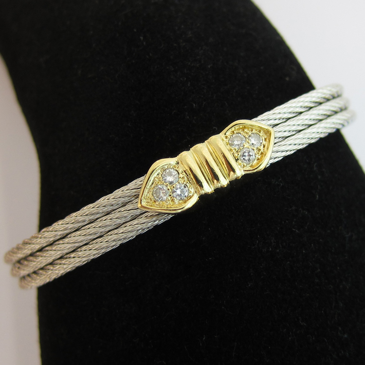 Bracelet FRED collection Force 10 modle en acier or et diamants